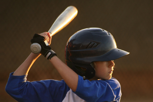 A youth baseball player at bat