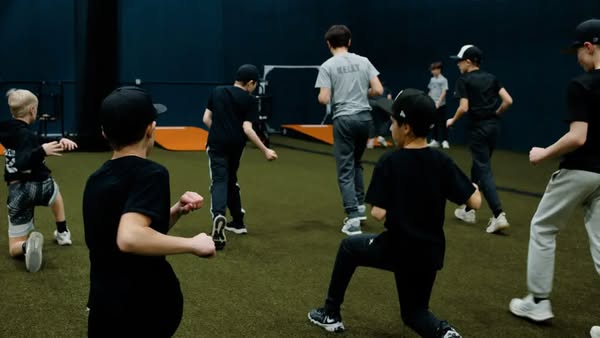 Players training in the batting cages
