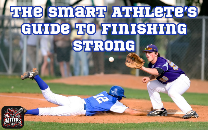 A baseball player sliding into first base